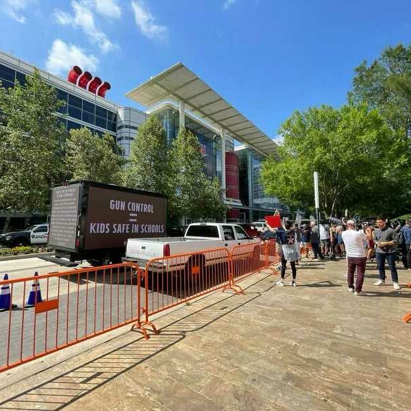 Mobile billboards demanding gun control